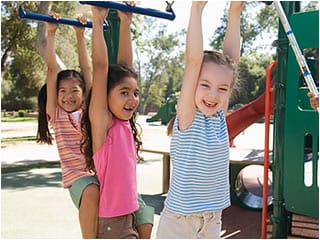 why play -recess kids playing on bars