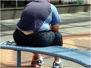 boy sitting physical education