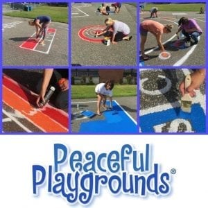 parents adding painted playground markings